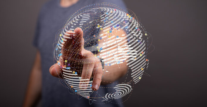Abstract image of a hand interacting with a digital globe, representing global connectivity, technology, and innovation. Perfect for