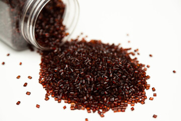Dark Red Polymer Granules for Plastic Production