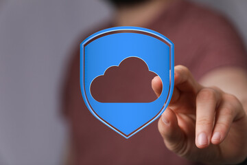 Hand holding cloud data security icon. Symbol for protection, safety, and modern technologies....