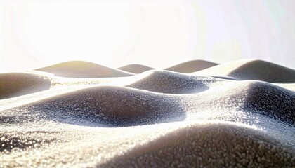 A landscape of rolling snow-covered dunes, illuminated by bright sunlight, with visible ice crystals sparkling on the surface.