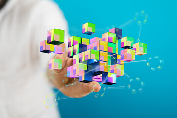Digitally rendered image of colorful cubes floating from hand, symbolizing digital connection,...