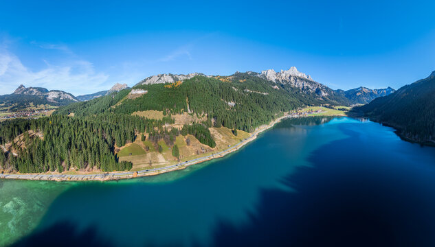 Aerial photo of Lake Haldensee in the Tannheim Valley with village oh Haller and Rote Fluh summit, Tyrol, Austria