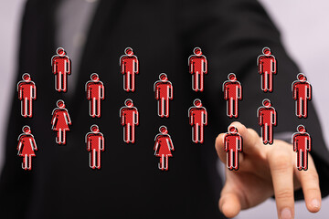 A person pointing to a network of digital people icons representing connection, teamwork, and the digital lands