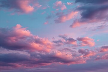 Vibrant Sunset Sky With Pink Clouds Over a Calm Horizon in Soft Blue and Purple Tones, Creating a Dreamy, Serene Evening Atmosphere