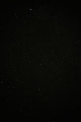 Starry Night Sky with Endless Twinkling Stars in Deep Black Space
