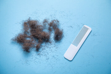 Human body hair on the blue background.