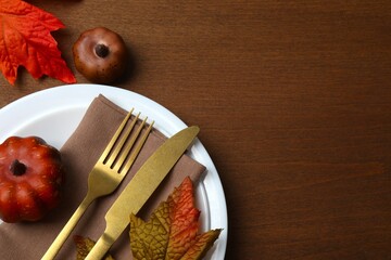 Elegant autumn tablescape with pumpkins and rustic decor. Perfect for Thanksgiving and Harvest Festival