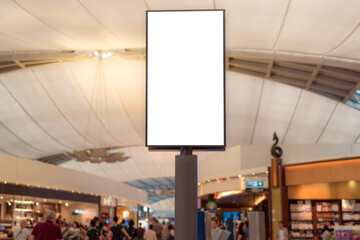 Blank white mock up of vertical light box billboard at the airport
