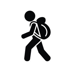 Silhouette of a person walking with a backpack