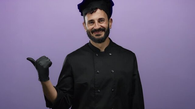 Hispanic bearded chef in black attire smiles against a vibrant purple backdrop, conveying a sense of culinary pride and inviting warmth with a thumbs-up gesture.