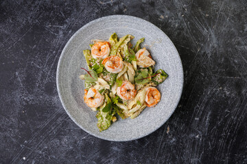Shrimp Salad with Fresh Herbs on a Gray Plate