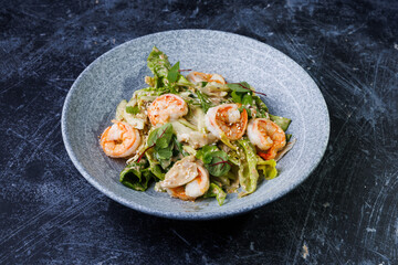 Shrimp Salad with Fresh Herbs on a Gray Plate