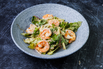 Shrimp Salad with Fresh Herbs on a Gray Plate