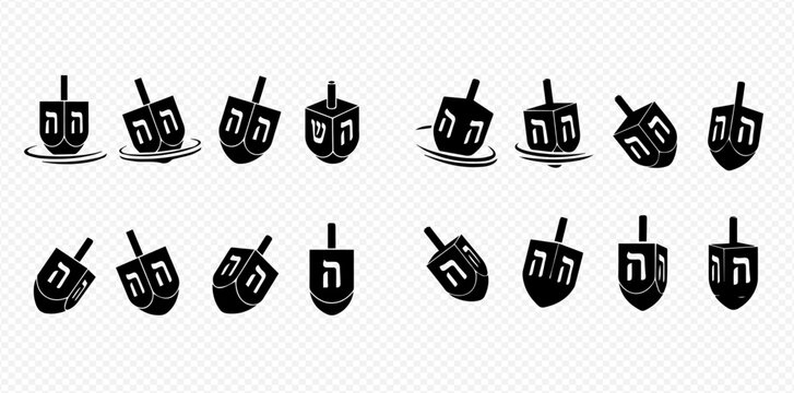 A collection of dreidels, traditional spinning tops used during the Jewish holiday of Hanukkah, in various orientations.