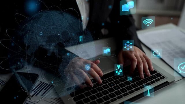 A professional individual types on a laptop, immersed in a digital environment. Numerous icons represent technology and connectivity, illustrating a modern workspace. Xenic