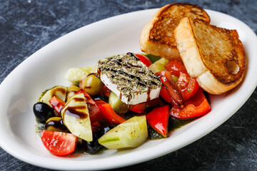 Colorful Mixed Vegetable Salad With Grilled Bread Served