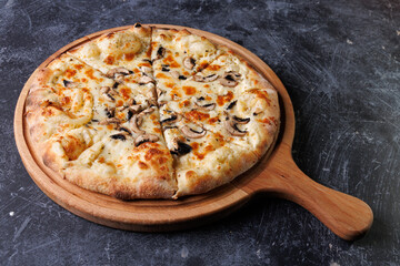 Gourmet Mushroom Cheese Pizza On Circular Wooden Board