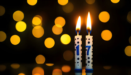 Photo of burning candles shaped as number seventeen. Flames light up over dark background with soft bokeh. Birthday or anniversary event celebration