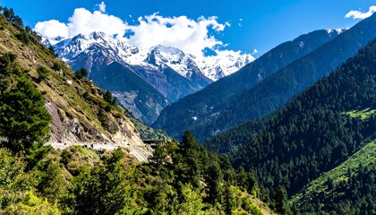 Obraz premium Serene Mountain Valley Landscape with Snow-Capped Peaks and Lush Greenery.