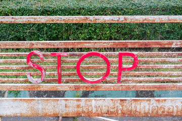 Obraz premium Old Stop Sign in parking,Parking symbol,traffic sign,sign prohibiting parking,No parking here road sign.