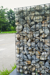 Stone wall of commercial site,various size geometric stones,natural slate stone background texture,rock texture of various shapes and sizes.