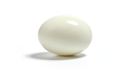 Close-up of a perfectly round, creamy white sphere on a white backdrop