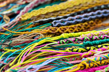 Colorful bracelets made of waxed film, characteristic of hippie culture