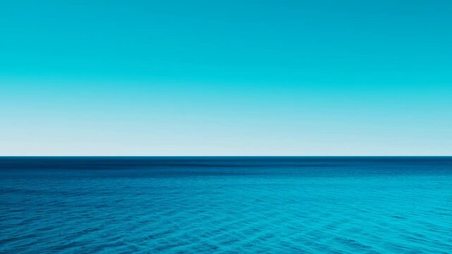 Film grain for color grading, tranquil blue ocean and sky.