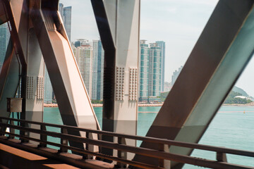cars driving on the bridge road over sea,Highway traffic jam,rush hour,public transport.	