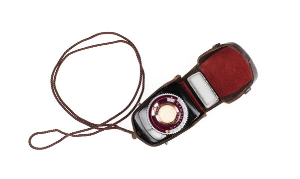 Vintage photo light meter isolated on white background