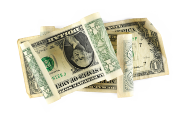 American dollar bills, paper money banknotes isolated on white background, top view