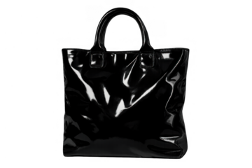 Black glossy tote bag representing luxury fashion accessory style. Transparent background cut out for e-commerce design