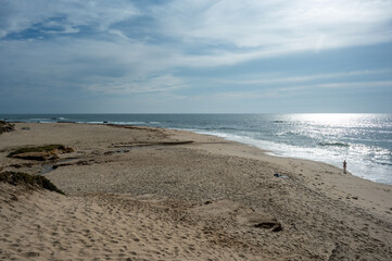Praia de Canide, Canide Beach, on northern coast of Portugal in Vila Nova de Gaia under dramatic autumn cloudscape.