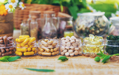 Supplementi and medicinal herbs and flowers. Selective focus.