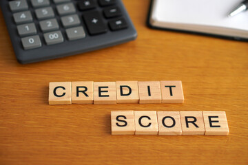 credit score. financial and business concepts. words written with wooden letters