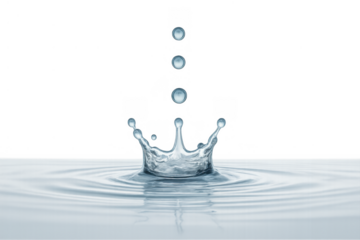 Water drop falling, creating a crown splash and concentric ripples on the surface, clean and clear liquid reflecting light