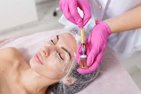 Preparing under eye mesotherapy syringe with anesthetic for bioreparation in clinic