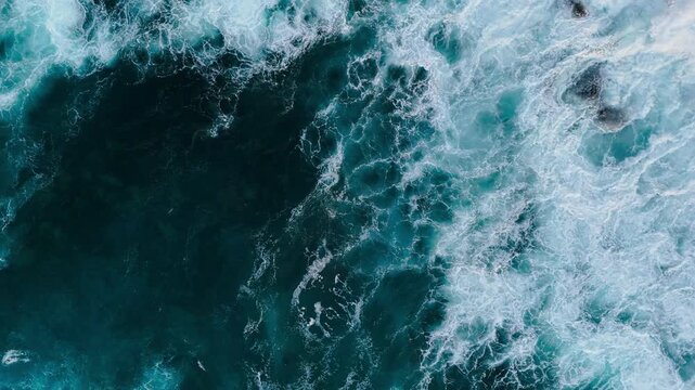 Atlantic Ocean water movement with foamy surf texture, viewed from above