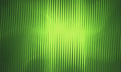 Vibrant green corrugated metal texture abstract background with vertical lines and light flare for industrial design backdrop