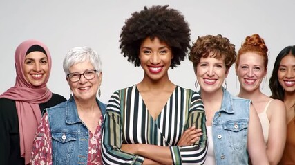 Smiling diverse women standing together in a show of unity and empowerment
