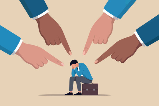 Man facing public shaming, blame, and accusation in the workplace.