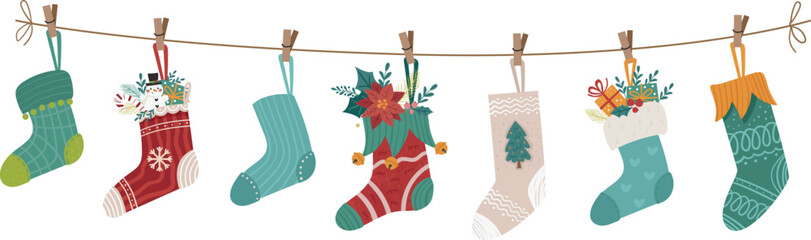 Christmas socks and stockings hanging on a rope with clothespins. Perfect for the festive Christmas season, as well as fall and winter merchandise.