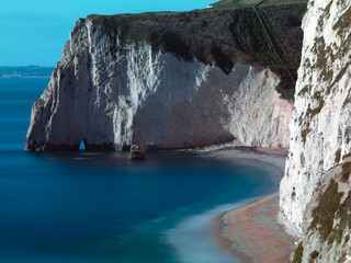 Extremely long exposure tight shot of Swyre head and butter rock on the Jurassic coast.  Dorset.
