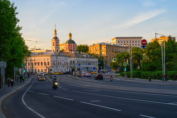 Obraz premium Sunset view of old street in Moscow, Russia. Cozy cityscape of Moscow. Architecture and landmarks of Moscow.