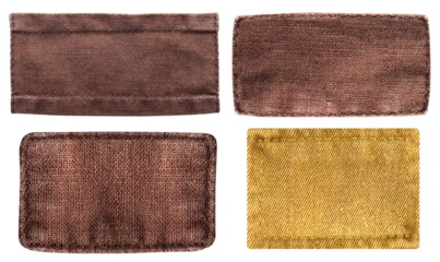 Isolated photo of brown colored cloth patches with stitch borders on white background.