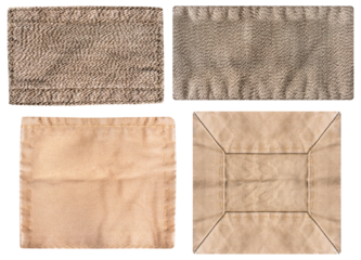 Isolated photo of brown colored cloth and denim patches with stitch borders on white background.