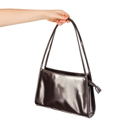 Isolated photo of female hand holding brown leather purse or bag with copy space on white...