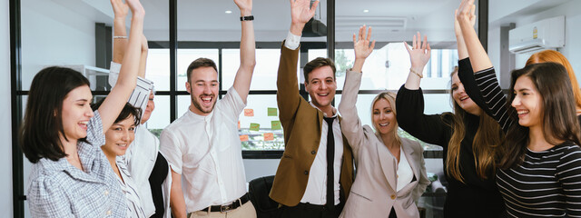Business team showing unity success with hands together in office, teamwork collaboration and power motivation, diverse colleagues celebrating achievement corporate goal partnership