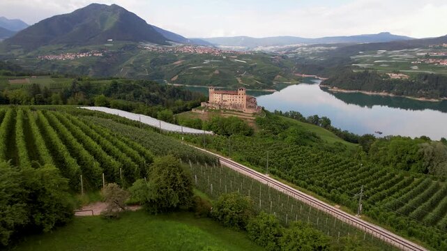 most romantic and beautiful medieval castles of northern Italy. scenic Cles castel- in Trentino , province of Trento. lake Santa Giustina. Val di Non apple valley. aerial drone cinematic 4k hd footage