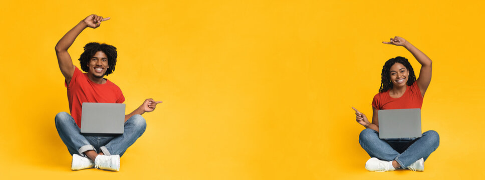 A man and a woman sit cross-legged with laptops on their laps. They are smiling and pointing upwards, expressing excitement or happiness in a vibrant yellow setting, ideal for digital media.